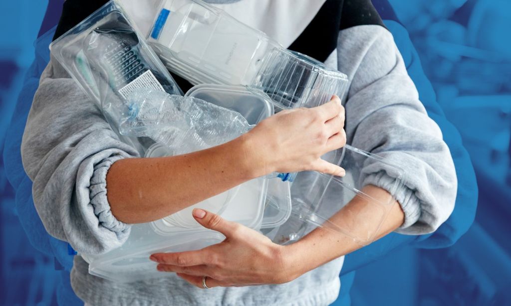 woman holding plastic containers