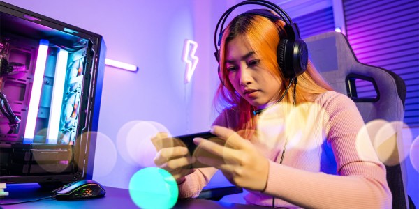 Gamer playing on their phone.