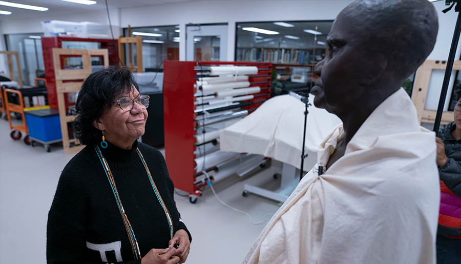 Irene Ridgeway with statue of Nelly Walker